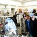 Shopper Kim Furey tries on an assortment of sunglasses at Nordstrom Rack on Tuesday, April 16. AnnArbor.com I Daniel Brenner